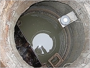 Measurign weir in a well